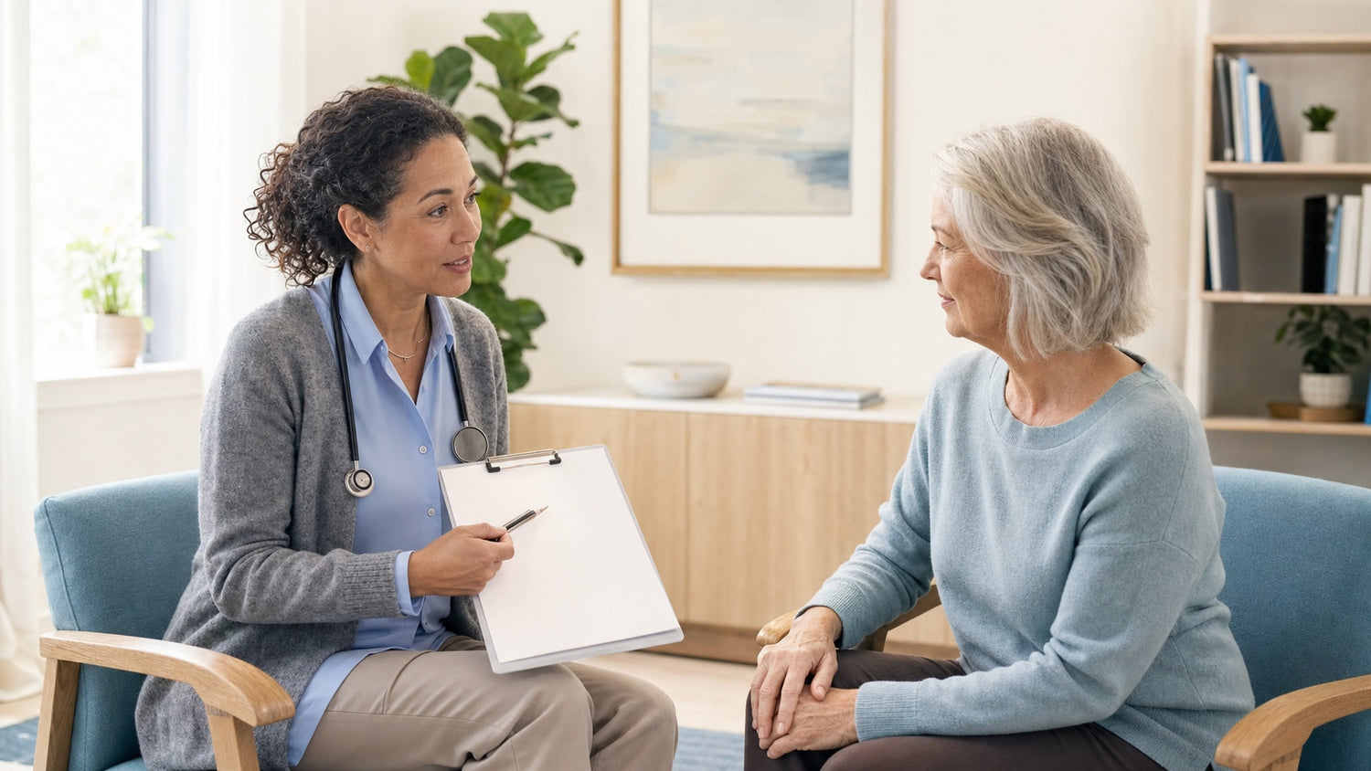 Older adult discussing TENS contraindications and safety with a healthcare professional