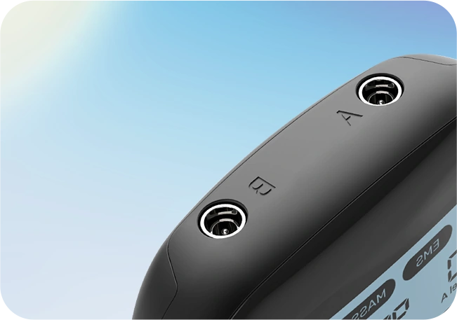 Close view of KONGZEE TENS unit channel A and B lead wire ports